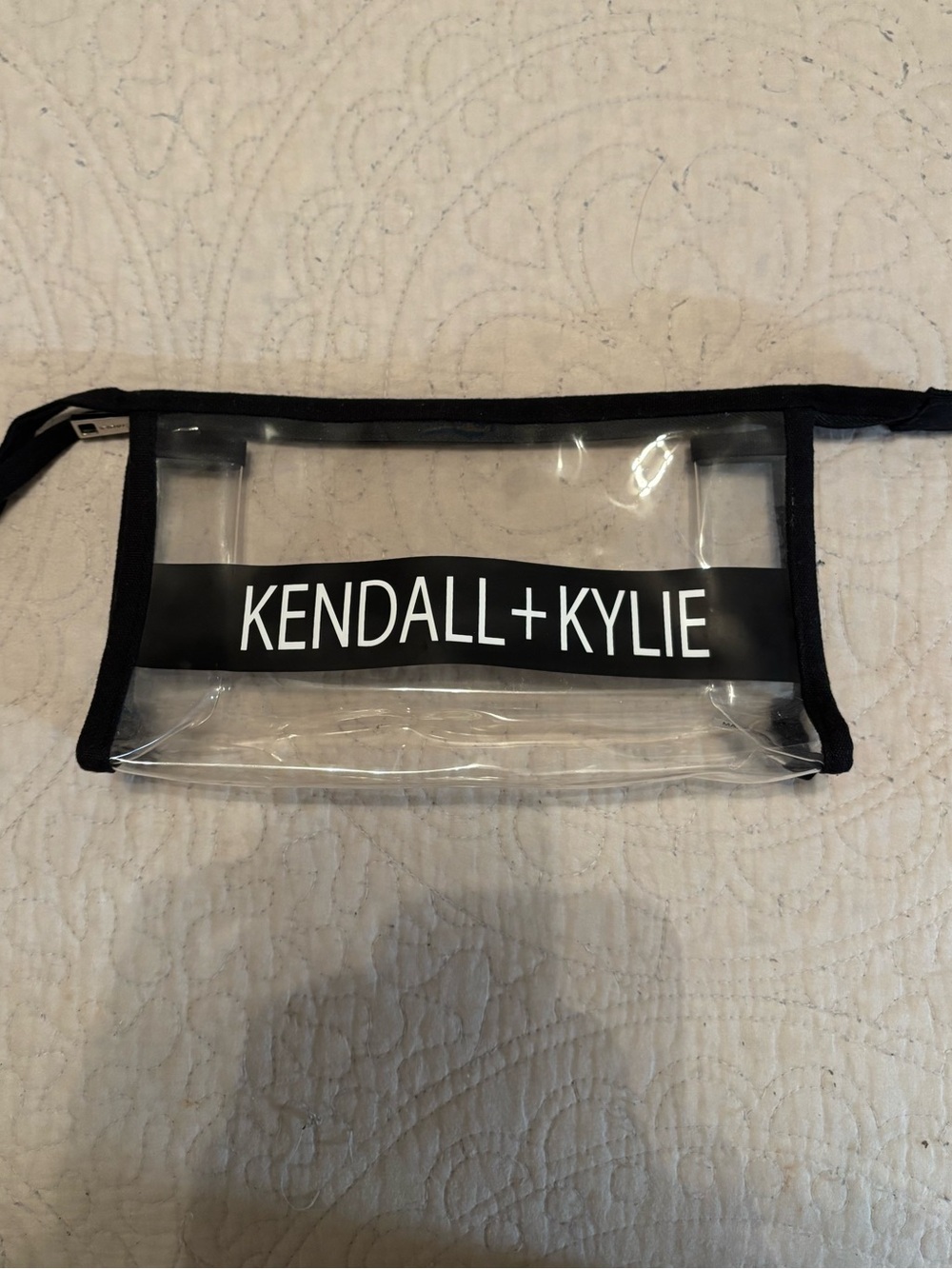 Kendall & Kylie Clear Toiletry Pouch with Black Trim and Logo